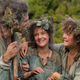 Three Harfoots smiling.